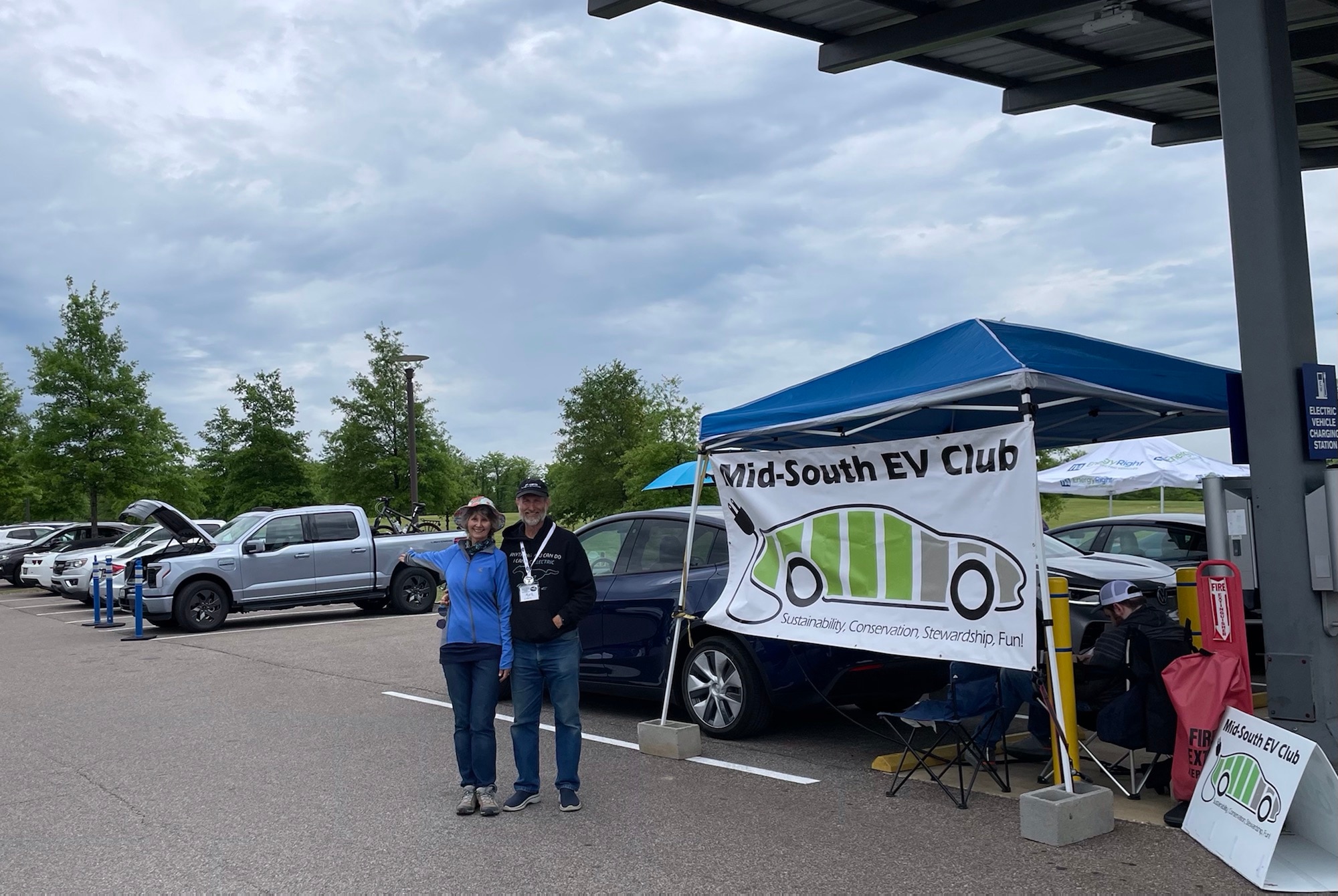The Eakins at the Mid-South EV Club with Sherman the F-150® Lightning® truck.